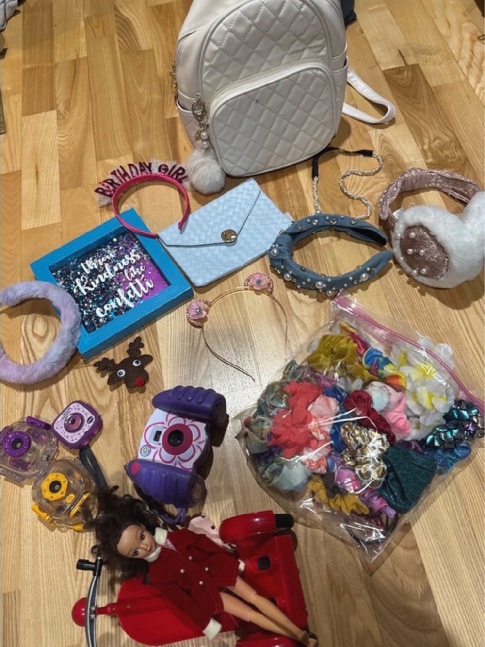 Kids White Quilted Backpack, cameras, coding doll, and Accessories